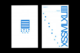 Cahier blanc imprimé bleu d'une édition de design graphique, pictogrammes