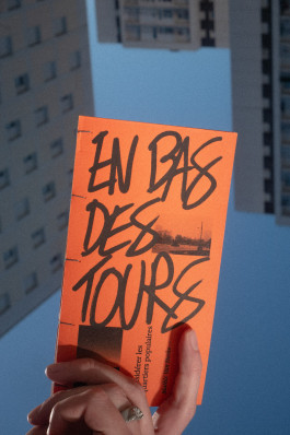 Édition d'un mémoire en design graphique sur les quartiers populaires, couverture orange, reliure cousue